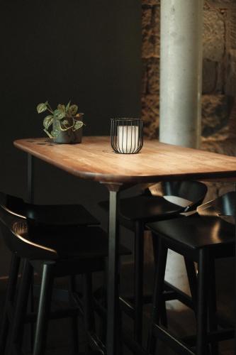 a wooden table with some plants on top of it at Fritz Lauterbad in Freudenstadt