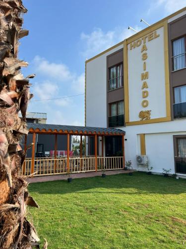 un hotel con un letrero que lee hotel abacus en Asimado Hotel en Antalya