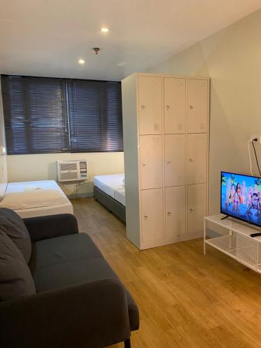 TV a/nebo společenská místnost v ubytování Burgos Hub Hostel