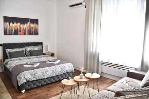 Apartment in Belgrade with small parking space tesisinde bir odada yatak veya yataklar