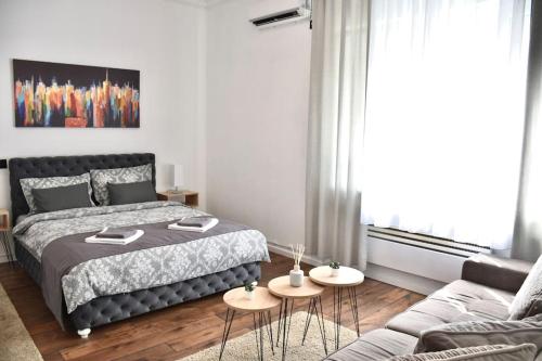 Ένα ή περισσότερα κρεβάτια σε δωμάτιο στο Apartment in Belgrade with small parking space