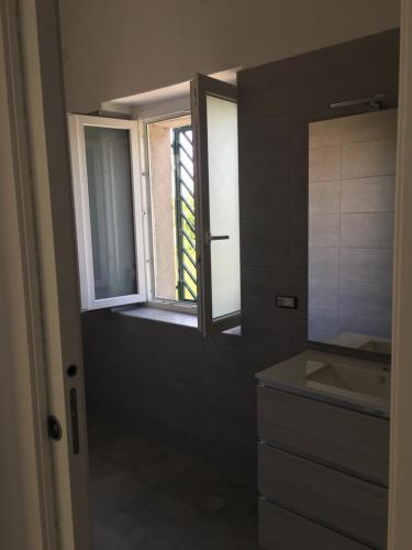 Koupelna v ubytování Residenza Rogiò