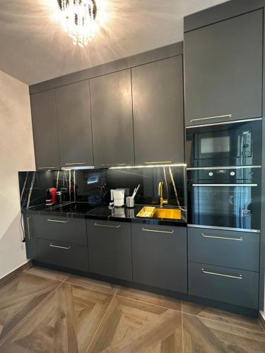 Η κουζίνα ή μικρή κουζίνα στο ZeN Luxury Suite
