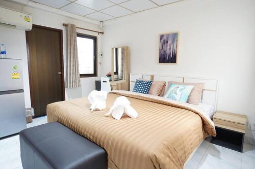 Postel nebo postele na pokoji v ubytování Maruay Living Apartment 506 (Khaosan/Chinatown/Samyot MRT)