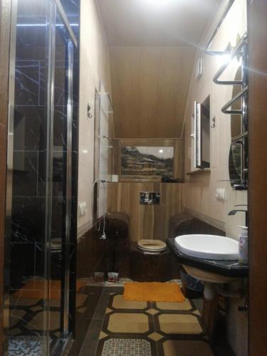 Ein Badezimmer in der Unterkunft Hotel Chateau