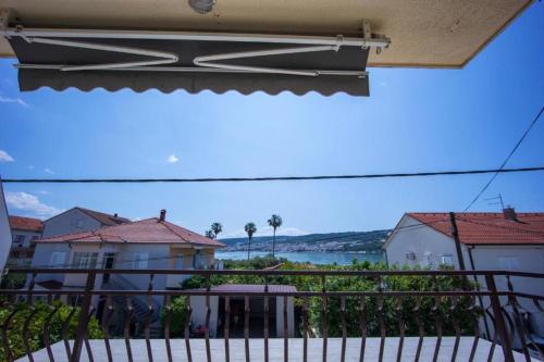 a balcony with a view of the ocean at Villa Marija in Trogir