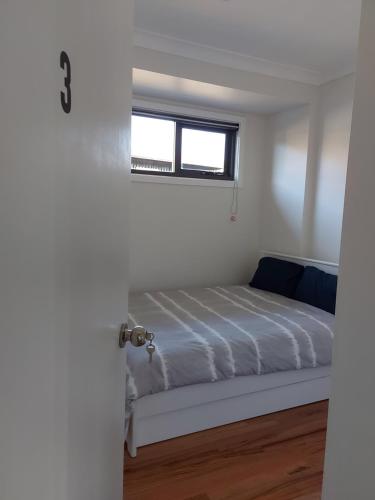 Maruve Guesthouse 12 min from Melb airportにあるベッド
