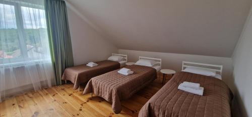 Postel nebo postele na pokoji v ubytování TREND HOUSE Apartments