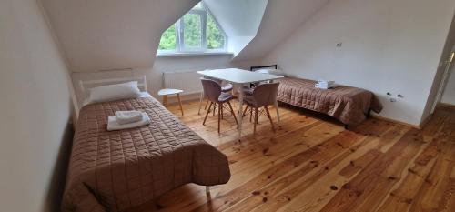 Postel nebo postele na pokoji v ubytování TREND HOUSE Apartments