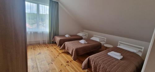 Postel nebo postele na pokoji v ubytování TREND HOUSE Apartments