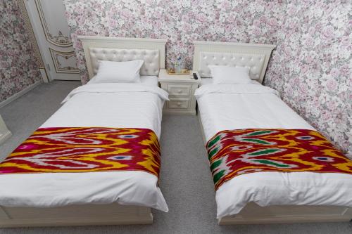 Letto o letti in una camera di CRYSTAL GUEST HOUSE