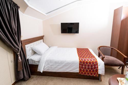 Letto o letti in una camera di CRYSTAL GUEST HOUSE