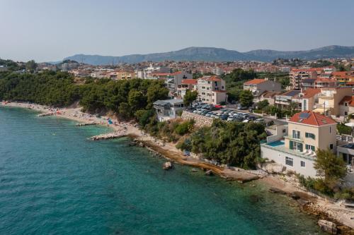 an aerial view of a beach in a town at Epetium Beach Villa in Split