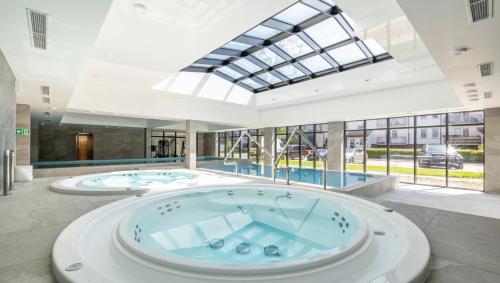 Apartamenty OnHoliday - VIP - Green Port ze strefą Wellness & Family