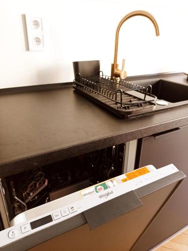Η κουζίνα ή μικρή κουζίνα στο Apartament Home Mi