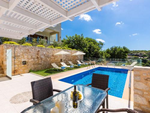an image of a villa with a swimming pool at Villas in Crete with Private Pool & Beaches in Achlades