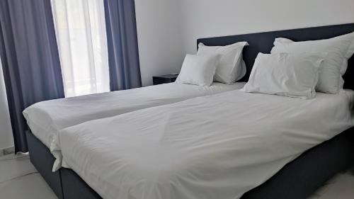 Rúm í herbergi á Luxury Apartment Trogir