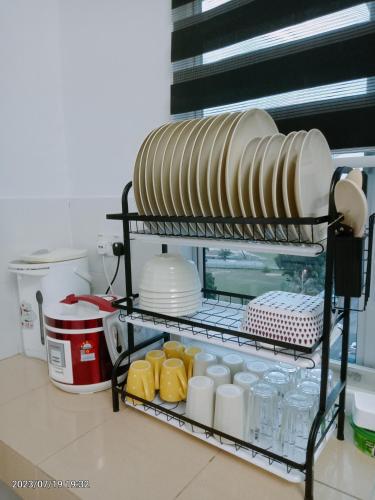 Η κουζίνα ή μικρή κουζίνα στο Homestay Triple Q Manjung