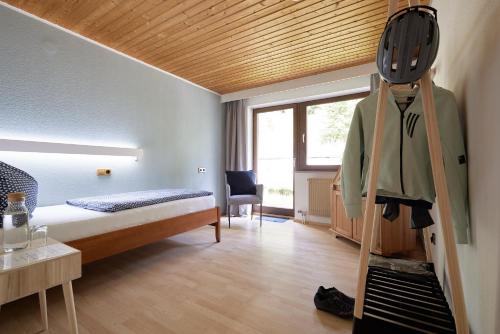 Ένα ή περισσότερα κρεβάτια σε δωμάτιο στο Landhotel Fuchs