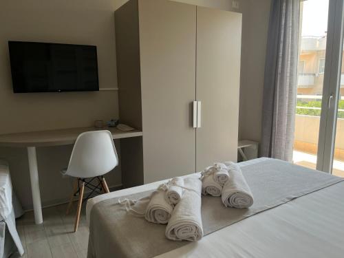 Ένα ή περισσότερα κρεβάτια σε δωμάτιο στο B&B L’ALTRAMURGIA