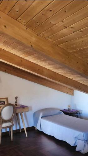 Giường trong phòng chung tại B&B Il borgo incantato
