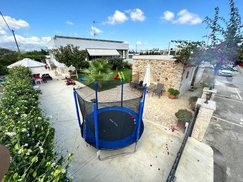 a view of a ping pong table on a street at BIO Garden Stonehouse in Gonia