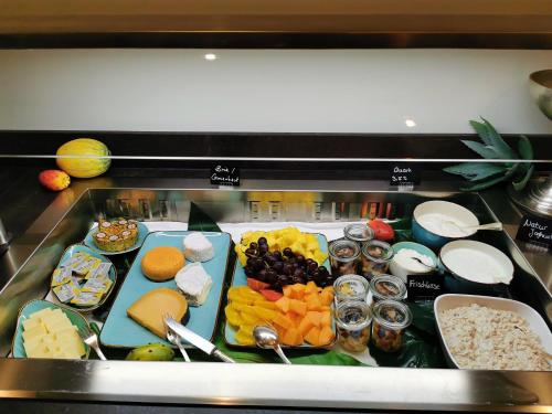 a tray of food with different types of food at Romantik Hotel-Restaurant Altenberger Hof in Odenthal
