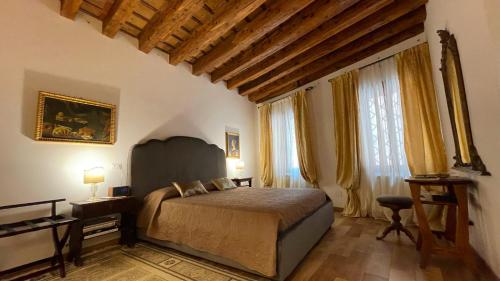 Krevet ili kreveti u jedinici u okviru objekta Leone Marciano Venice Apartment Independent and private entrance