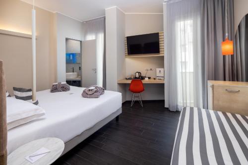 Postel nebo postele na pokoji v ubytování Best Western Maison B Hotel