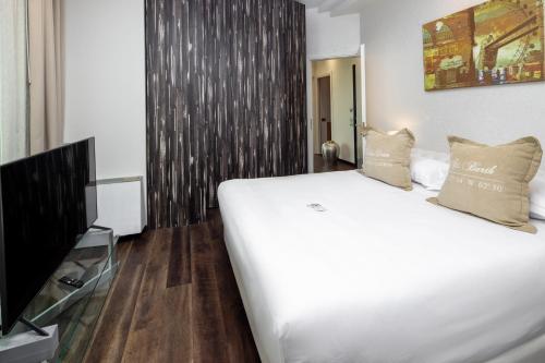 Postel nebo postele na pokoji v ubytování Best Western Maison B Hotel