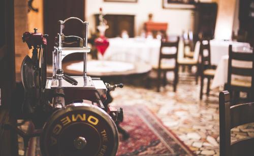 Ένα ή περισσότερα κρεβάτια σε δωμάτιο στο Quari Hotel Restaurant & Pizza