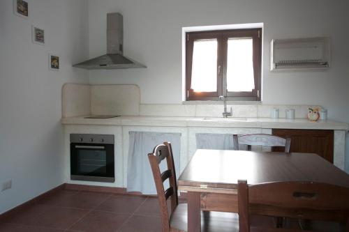 Kuchyň nebo kuchyňský kout v ubytování Masseria Stella