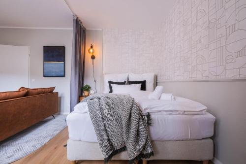 Ένα ή περισσότερα κρεβάτια σε δωμάτιο στο Apartments an der Universität