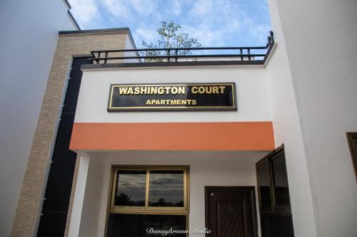 a sign on the side of a building at Executive Large Room with Ensuite in Accra
