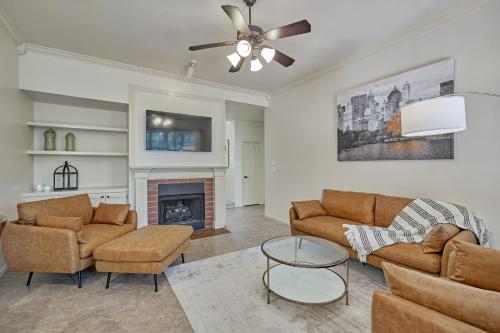 a living room with two couches and a fireplace at New! Pool, Spa, Nature Trails - The Woodlands 4BR Forest Retreat! in Spring