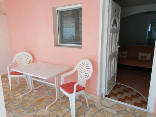 Foto dalla galleria di Apartmani Marija i Josip a Vir (Puntadura)