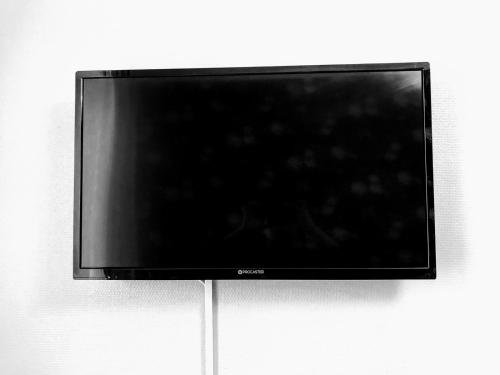ヘルシンキにあるオルキデア カンピの薄型テレビが備わります。