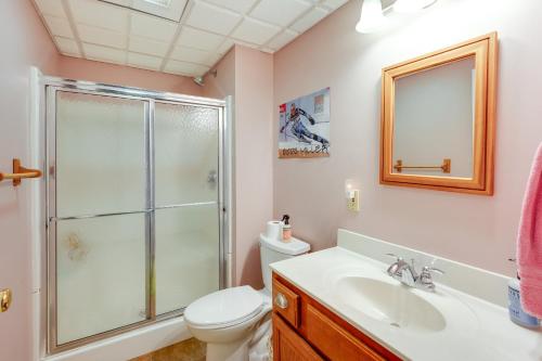 A bathroom at Burke Mountain Vacation Rental Ski-InandSki-Out!