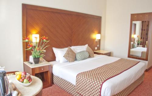 Katil atau katil-katil dalam bilik di Regent Palace Hotel
