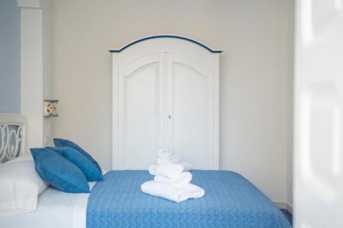 Letto o letti in una camera di Relais Capitolo