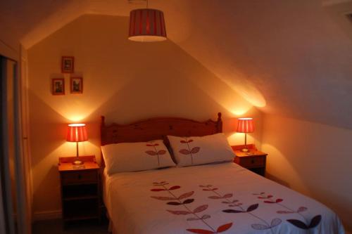 Postel nebo postele na pokoji v ubytování Haven Cosy Cottage