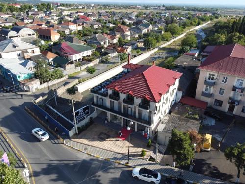 an aerial view of a small town with a street at EZ Restoran & Hotel in Zaqatala