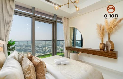 Paramount 2 Bed Apt, Roof Top Bar and Pool overlooking Burj, Triple Balcony, Fully Equipped, Free Toiletries, Full Kitchen, 2 and half Bathrooms, Ground Floor Supermarket, Influencers Haven, Sunrise and Sunset Views over the Sea From All Balcony