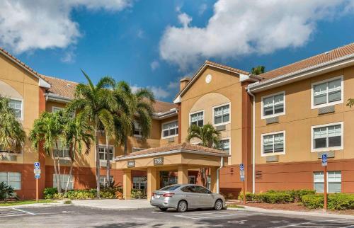 a car parked in front of a building at Extended Stay America Suites - Fort Lauderdale - Plantation in Plantation