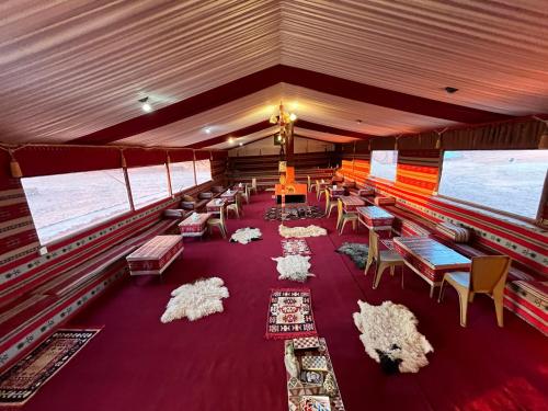 an overhead view of a room with tables and chairs at Magic Bedouin Star in Wadi Rum