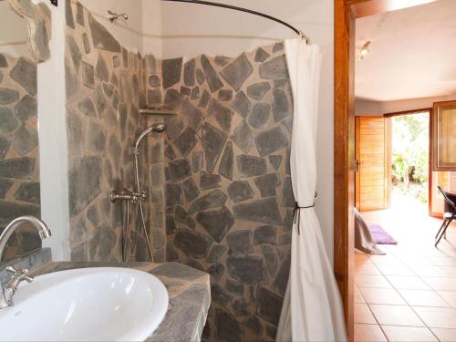 a bathroom with a sink and a shower at beautiful 5 bedroom property with sea view, private tennis court private pool in Arucas