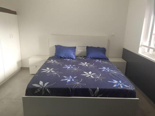 Postel nebo postele na pokoji v ubytování Ado Mishkan
