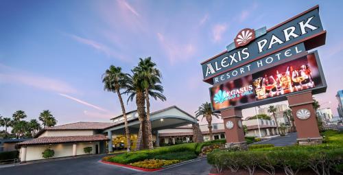 un letrero para el hotel alvis park en Alexis Park All Suite Resort en Las Vegas