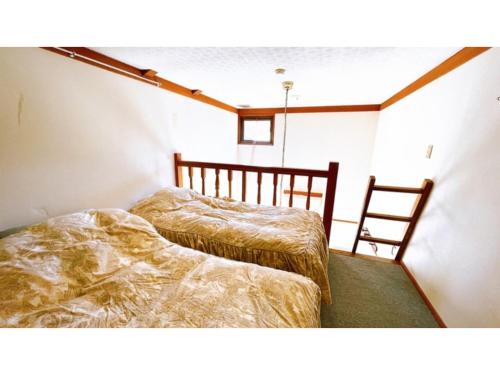 Кровать или кровати в номере Hakuba Pension Meteor - Vacation STAY 63322v