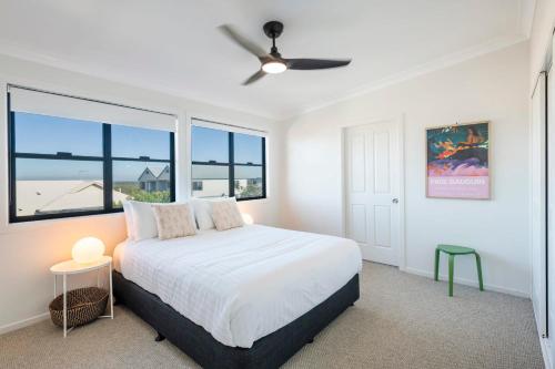 Postel nebo postele na pokoji v ubytování The Hill - Oceanstays